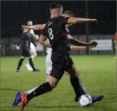  ??  ?? Cian Kavanagh battling in midfield with Jack Keaney of U.C.D.