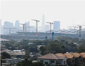  ?? — The Nation/Asia News Network ?? Hazy day: The skyline around Bang Sue Central Station is shrouded in smog.