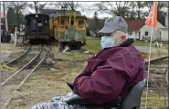  ?? BEN HASTY — MEDIANEWS GROUP ?? David Shirey with some of the train cars on his property at the Geigertown Central Railroad Museum in Geigertown, Union Township, Wednesday afternoon, January 6, 2021. The museum is in memory of David’s son DJ who was killed 1993 and loved the railroad.