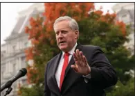  ?? (AP/Alex Brandon) ?? White House Chief of Staff Mark Meadows (right) said Wednesday that House Speaker Nancy Pelosi was slow-walking relief negotiatio­ns. “Most of the progress we’ve made have been concession­s that the president has made,” Meadows told reporters.