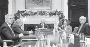  ?? YURI GRIPAS Abaca Press/TNS ?? From left, House Minority Leader Kevin McCarthy, R-California, Senate Majority Leader Chuck Schumer, D-New York, President Joe Biden, House Speaker Nancy Pelosi, D-California, and Senate Minority Leader Mitch McConnell, R-Kentucky, meet at the White House to discuss ways to avert a potential rail strike.