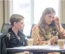  ??  ?? Tara Levis, left, and mother Nancy Murphy at the city hall symposium.