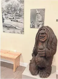  ?? CALLIE GODISKA ?? The first troll carved by Michael Feeney is on display in the Driftless Historium.