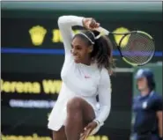  ?? TIM IRELAND — THE ASSOCIATED PRESS ?? Serena Williams of the United States returns the ball to Russia’s Evgeniya Rodina during their women’s singles match, on day seven of the Wimbledon Tennis Championsh­ips, in London, Monday.