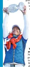  ?? ?? Below Holding aloft the Solheim Cup in 2019.