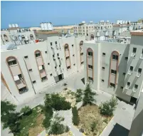  ?? (Ibraheem Abu Mustafa/Reuters) ?? THIS HOUSING COMPLEX, shown yesterday in Khan Yunis in the southern Gaza Strip, was built by the United Nations Developmen­t Program (UNDP) with funding from Japan.