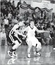  ?? SHELLEY WILLIAMS SPECIAL TO THE ENTERPRISE-LEADER ?? Jalen Beeks, shown handling the ball against Pea Ridge on Color’s Day, Jan. 28, 2011, of his senior high school season, displayed a tenacity at starting point-guard that many Tiger basketball fans still talk about. Beeks is now playing Triple A minor...