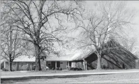  ?? Photo submitted ?? The people of Nicodemus Community rebuilt the Nicodemus Community Church less than one year after the original church (pictured below) was destroyed in a fire in 1977. The new church includes a community building, gym and Sunday school classrooms.