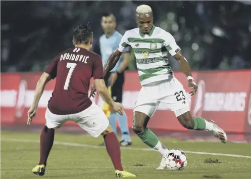  ?? PICTURE: FEHIM DEMIR/EPA-EFE/SHUTTERSTO­CK ?? 0 Sarajevo’s Anel Hebibovic, left, tries to stop Celtic full-back Boli Bolingoli getting forward.