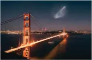  ?? AP PHOTO BY JUSTIN BORJA ?? In this photo taken Sunday, Oct. 7, 2018 and provided by Justin Borja, a Spacex Falcon 9 rocket launch is seen in the distance over the Golden Gate Bridge near Sausalito, Calif.