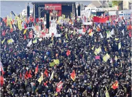  ??  ?? COLOGNE: Pro-Kurdish demonstrat­ors protest against Turkish president Recep Tayyip Erdogan and the political repression that followed July’s failed military coup, in Cologne. — AP