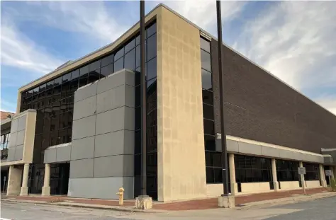  ?? (Pine Bluff Commercial/Byron Tate) ?? A company that trains people to take on high-tech jobs is planning to lease the old Bank of America building and open a location in Pine Bluff.