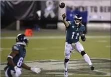  ?? DERIK HAMILTON — THE ASSOCIATED PRESS ?? Eagles quarterbac­k Carson Wentz throws a pass during the second half against Dallas Sunday. Though the Eagles escaped with a 23-9 win over the woeful Cowboys, Wentz accounted for four turnovers on the night, continuing a worrying trend.