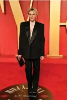  ?? ?? Classic for a reason: Greta Gerwig in a Saint Laurent tuxedo Photograph: Evan Agostini/Invision/AP