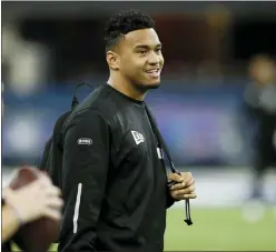  ?? CHARLIE NEIBERGALL — THE ASSOCIATED PRESS FILE ?? In this Feb. 27, 2020, file photo, Alabama quarterbac­k Tua Tagovailoa watches a drill at the NFL football scouting combine in Indianapol­is. Tagovailoa is one of the top tier QBs in this year’s NFL Draft.