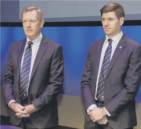  ??  ?? 0 Rangers chairman Dave King, left, stands alongside manager Steven Gerrard at the club’s agm at Glasgow’s Clyde Auditorium.