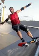  ??  ?? HERE I COME... A profession­al skater showing off skills and testing his limits on the ramp at the XDubai Skatepark.