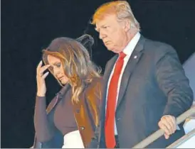  ?? AFP ?? ▪ Left: Chinese President Xi Jinping and First Lady Peng Liyuan wave upon their arrival at Ezeiza Internatio­nal Airport in Buenos Aires on Thursday. Top: US President Donald Trump and First Lady Melania Trump disembark from Air Force One after reaching the Argentine capital.