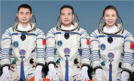  ?? Shenzhou-13 spacefligh­t mission. Photo: Xinhua ?? Chinese astronauts Zhai Zhigang (middle), Wang Yaping (right) and Ye Guangfu will carry out the