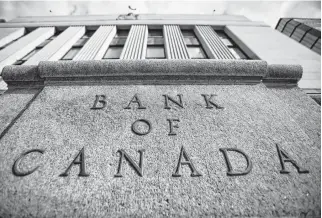  ?? CHRIS WATTIE • REUTERS ?? A sign outside the Bank of Canada building in Ottawa.