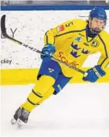  ?? DAVE REGINEK / GETTY IMAGES ?? Adam Boqvist, seen here skating with Sweden's U-18 national team, could land with the Rangers.