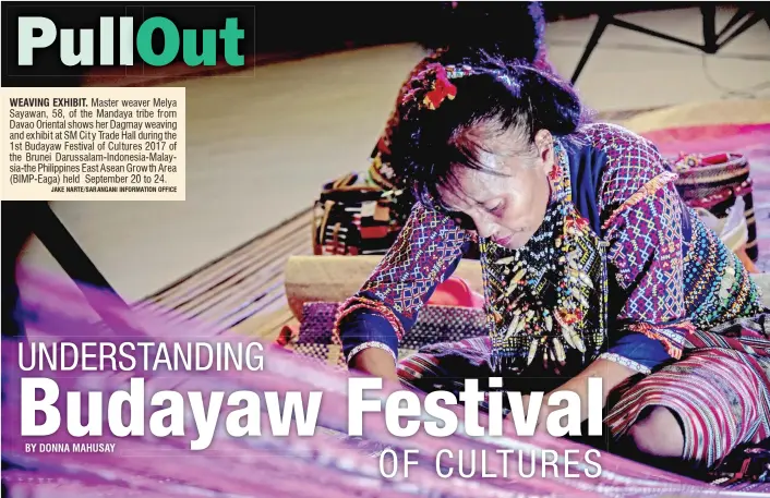  ?? JAKE NARTE/SARANGANI INFORMATIO­N OFFICE ?? WEAVING EXHIBIT. Master weaver Melya Sayawan, 58, of the Mandaya tribe from Davao Oriental shows her Dagmay weaving and ex hibi t at SM Ci t y Trade Hall during the 1st Budayaw Festival of Cultures 2017 of the Brunei Darussalam-Indonesia-Malaysia-the...