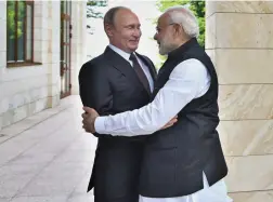  ?? — PTI ?? Prime Minister Narendra Modi meets Russian President Vladimir Putin in Sochi, Russia, on Monday.