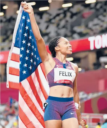  ?? MATTHIAS HANGST/GETTY ?? Allyson Felix reacts after winning the bronze medal in the women’s 400 meters on Friday in Tokyo.