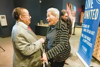  ?? SENTINEL JOE BURBANK/ORLANDO ?? Former Orange County Commission­er Mable Butler talks with retired Ninth Judicial Circuit Chief Judge Belvin Perry during the premiere at the Orlando Science Center of “Know Your Place,” a documentar­y produced by the Heart of Florida United Way that explores themes of history, racism, segregatio­n and bias in Central Florida on Monday. Butler, along with other prominent Black Central Floridians, is featured in the film.