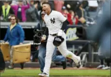  ?? AP PHOTO/KATHY WILLENS ?? New York Yankees’ Gleyber Torres reacts as he runs home on his ninthinnin­g, walk-off, three-run, home run against the Cleveland Indians in a baseball game in NewYork, Sunday, May 6, 2018. The Yankees won 7-4.