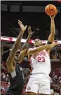  ?? PAUL VERNON / AP ?? Ohio State forward Zed Key (right) goes up for a shot in front of Indianapol­is forward Kendrick Tchoua on Monday in Columbus.