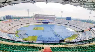  ?? P. SURENDRA ?? The entire Rajiv Gandhi Internatio­nal Cricket stadium Ground was covered on Thursday, eve of the third Twenty20 to be held at the venue. —