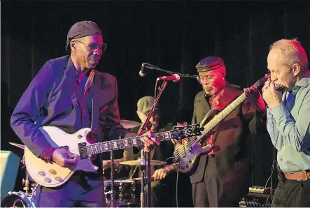  ?? PAM DOYLE/FILES ?? Charlie Butler of Canmore, in front on guitar, leads his band, Charlie B and the Groove Crew, as they play blues to a full house at ArtsPlace Nov. 30. The band is raising money to go to the Memphis Internatio­nal Blues Challenge from Jan. 16-20.