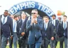  ?? MARK WEBER, THE COMMERCIAL APPEA L ?? Memphis head coach Mike Norvell takes part in Tiger Walk before taking on UConn in Memphis on October 6.