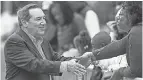  ?? JENNA WATSON/INDYSTAR ?? Sen. Joe Donnelly, D.-Ind., visits the Circle City Classic Parade in Indianapol­is.