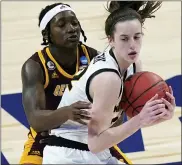  ?? ERIC GAY — THE ASSOCIATED PRESS ?? Central Michigan’s Micaela Kelly, left, tries to steal the ball from Iowa’s Caitlin Clark in CMU’s tourney loss on Sunday.