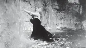  ??  ?? A famous Fellini scene: Anita Ekberg in Rome's Trevi Fountain in 'La Dolce Vita'