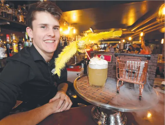  ?? Picture: MIKE BATTERHAM ?? House of Brews bartender Alastair Scanlon with their recently launched Harry Potter-themed cocktail called Platform 9¾.