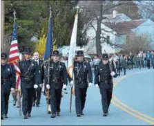  ?? PETE BANNAN – DIGITAL FIRST MEDIA ?? The West Goshen Police Honor Guard leads families and friends of victims of homicide and law enforcemen­t officers fallen in the line of duty along Pennsylvan­ia Avenue in Downingtow­n. A memorial service was held at Central Presbyteri­an Church followed...