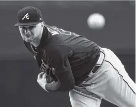  ?? THE ASSOCIATED PRESS ?? Atlanta Braves starting pitcher Sean Newcomb follows through during the first inning of Tuesday’s game against the Padres in San Diego.