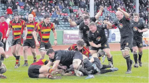  ??  ?? RGC celebrate scoring another try against Blackwood at Parc Eirias last Saturday. Pic: STEVE LEWIS