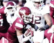  ??  ?? Wide receiver Malik Heath (4) runs with the football for Mississipp­i State on Saturday. (Photo by Mansel Guerry, for Starkville Daily News)