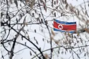  ?? AP ?? A North Korean flag flutters in the North Korea Embassy in Beijing on Saturday. US Secretary of State Rex Tillerson’s visit is expected to focus on efforts to end North Korea’s nuclear weapons and missile programmes.