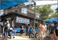  ?? The New York Times/JOHN TAGGART ?? The annual blueberry festival is held at the historic Whitesbog Village, N.J., in late June.