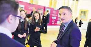  ?? Picture: Gavin Dando ?? Principali­ty CEO Steve Hughes chats to Ysgol y Strade pupils.