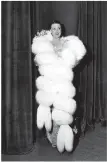  ?? CHRIS WARE/ KEYSTONE FEATURES/ GETTY IMAGES) ?? Gypsy Rose Lee begins her act at the Hippodrome in white fox fur. Audiences were disappoint­ed that she didn’t take her clothes off