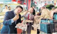  ?? @GOVRONDESA­NTIS ON TWITTER ?? Gov. Ron DeSantis, from left, eats with Palm Beach County Mayor Dave Kerner and commission­ers Mack Bernard and Maria Sachs at Delray Beach Market on Saturday.