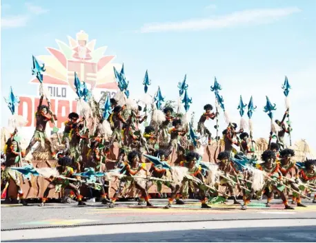  ?? PHOTOGRAPH COURTESY OF BINGOPLUS ?? CONTESTANT­S of the Dinagyang ILOminatio­n Streetdanc­e Competitio­n perform in Iloilo City.