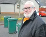  ?? 17_T08_AngusMacPh­ee01_work vans parking ?? Angus MacPhee used wheelie bins to stop vans parking at his home.