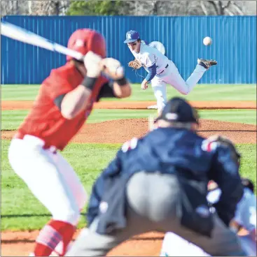  ??  ?? Ringgold pitcher Holden Tucker fires toward the plate during Thursday’s home game with LFO. Tucker struck out 11 of the 15 batters he faced in a five-inning perfect game. The Tigers also belted three homers in an 11-0 victory over their county rivals....